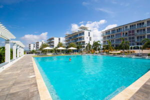 Grand View Residences with swimming pool and palm trees